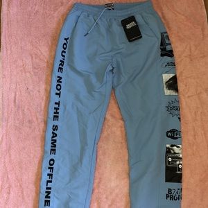 Broken promises track pants